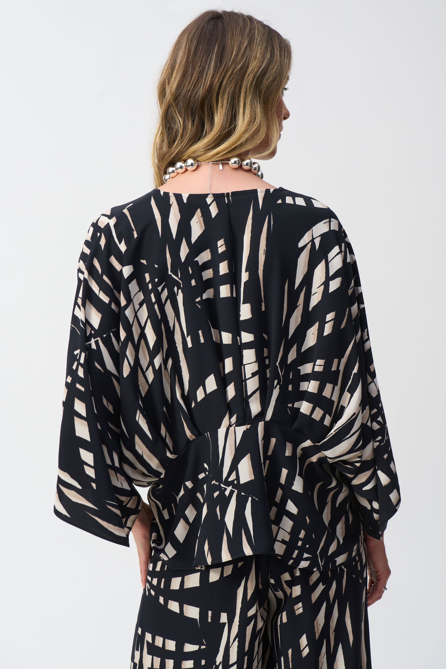 251047 Woven Tropical Print Peplum Top